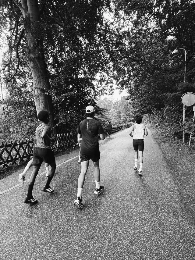 Three runners on the road
