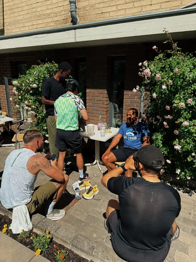 Gathering by the rose bush