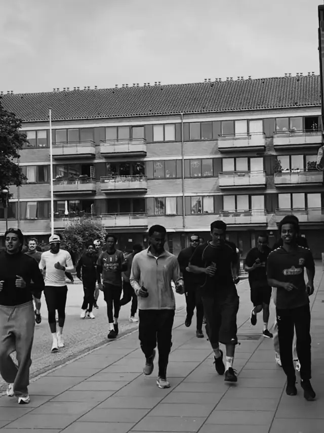 A group running through the street