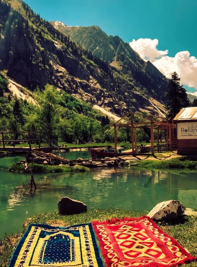 Blankets by a mountain lake