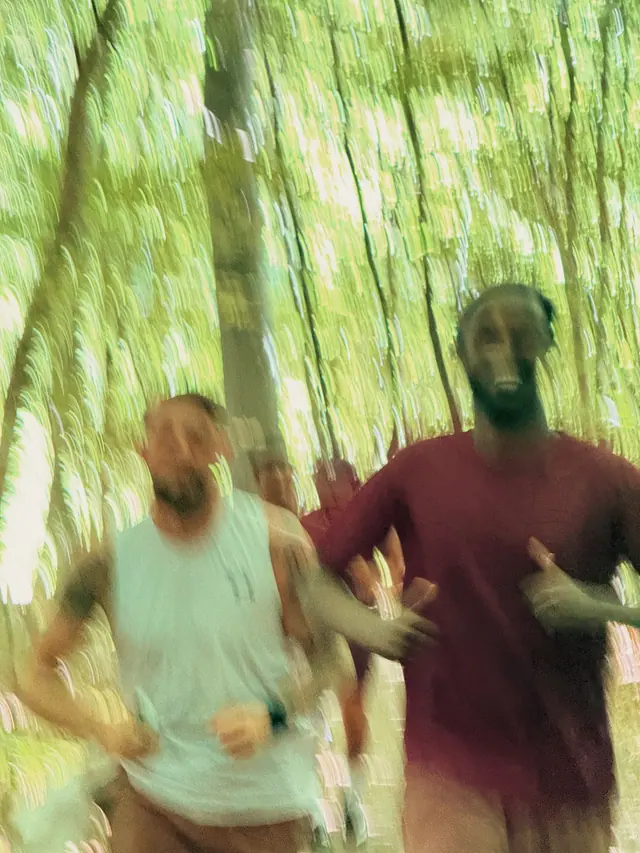 Two runners in motion blur