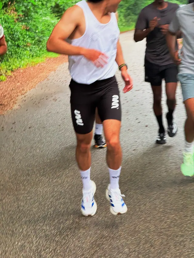 Close-up of a runner on a gravel path