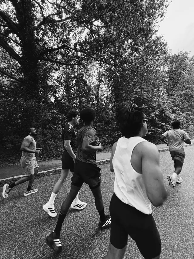 A group running under trees